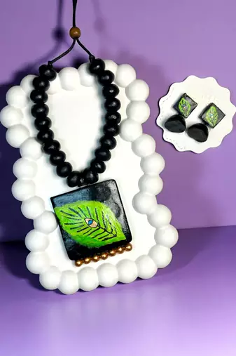 handcrafted leaf pendant set with earrings