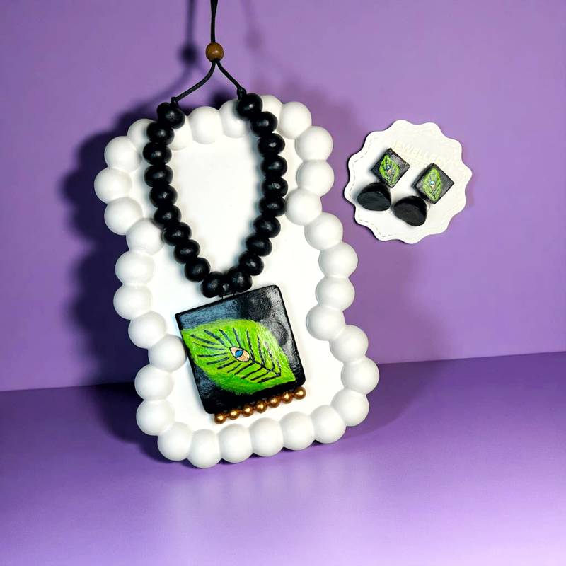 handcrafted leaf pendant set with earrings