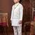 Boys white satin embroidered kurta pant set with waistcoat & necklace