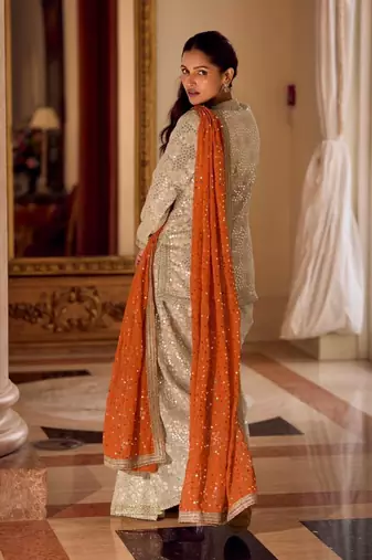 Cream Georgette Free Size Stitched Suit with embroidered Beats 