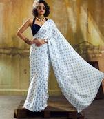 White & sky color polka dots printed japan satin saree with unstitched blouse