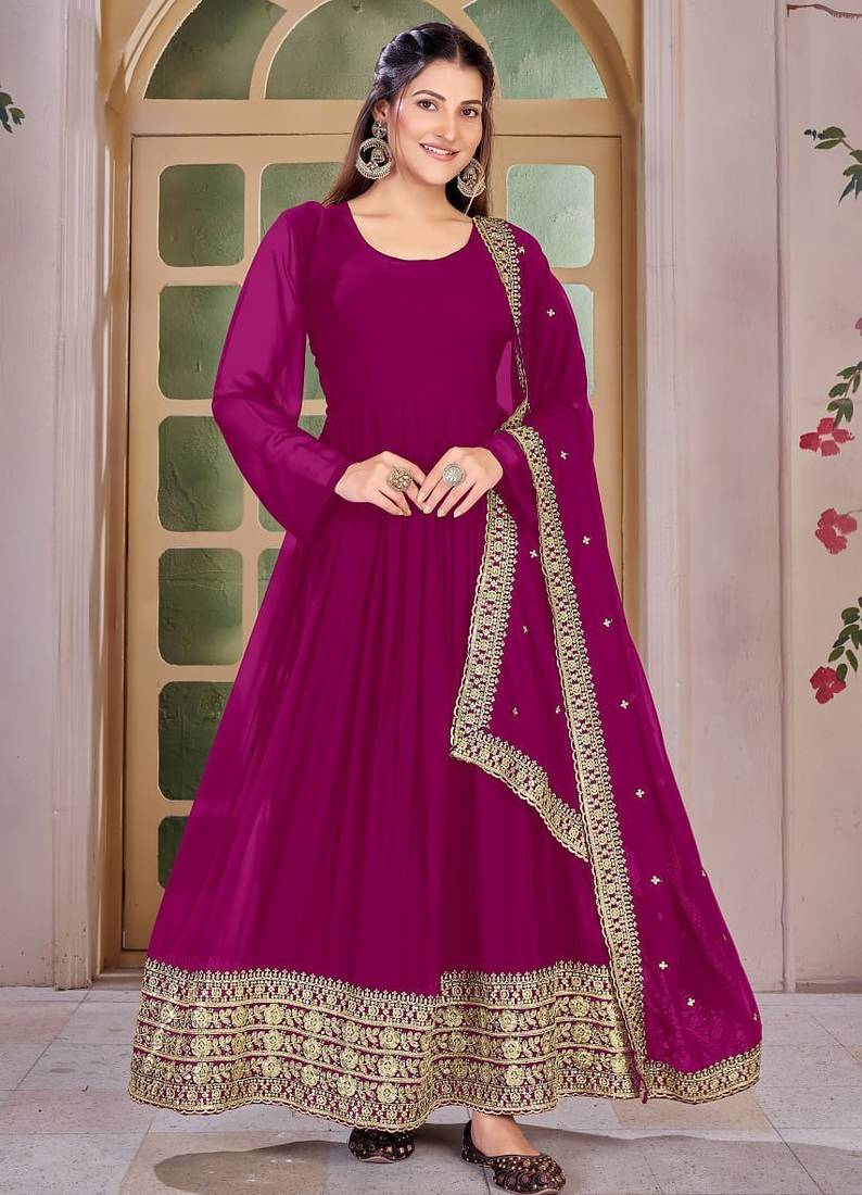 Woman's pink festival long gown with embroidery sequnce work