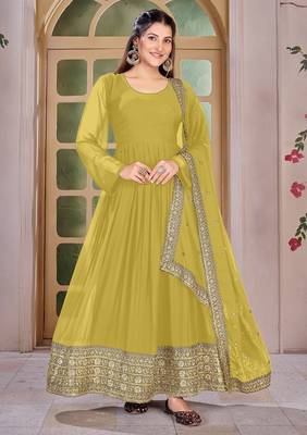 Woman's yellow festival long gown with embroidery sequnce work 1
