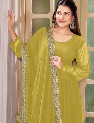 Woman's yellow festival long gown with embroidery sequnce work 2