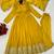 Woman's yellow festival long gown with embroidery sequnce work