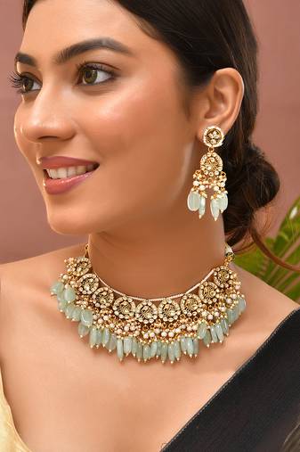 Gold plated kundan green stones necklace set