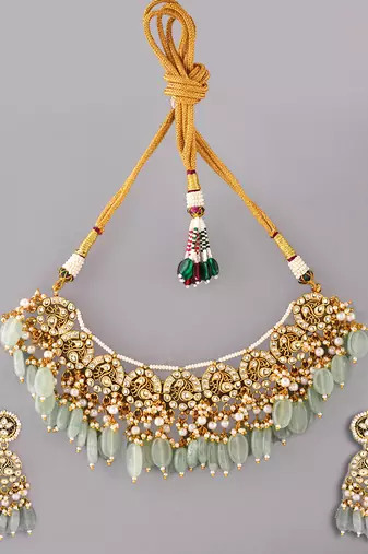 Gold plated kundan green stones necklace set
