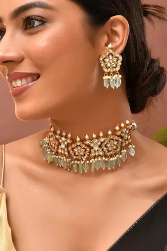 Gold plated kundan green stones choker set