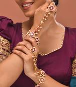Gold plated kundan red stones hathphool