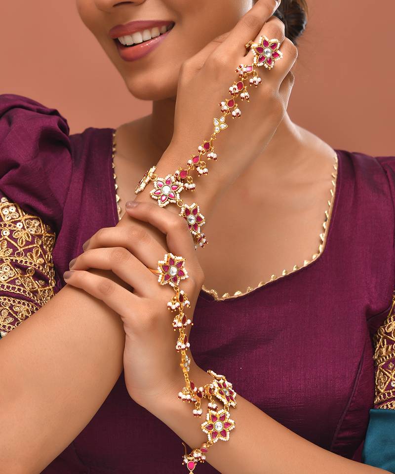 Gold plated kundan red stones hathphool