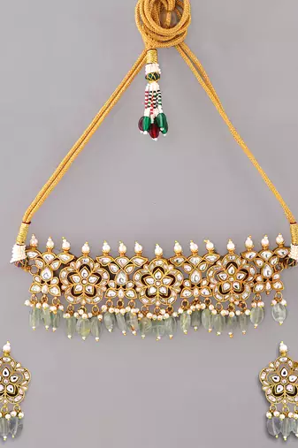 Gold plated kundan green stones choker set