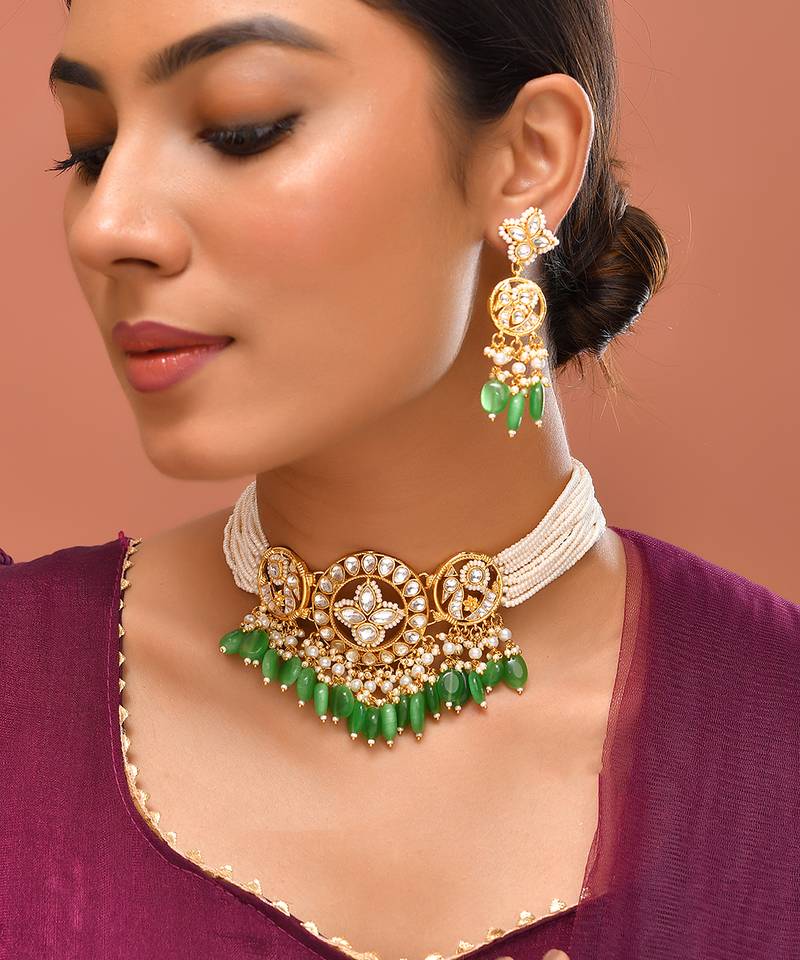 Gold plated kundan green stones choker set