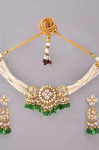 Gold plated kundan green stones choker set