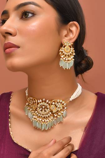 Gold plated kundan green stones choker set
