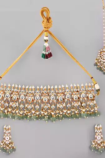 Gold plated kundan green stones choker set