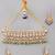 Gold plated kundan green stones choker set