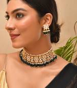 Gold plated kundan green stones choker set