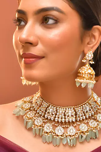 Gold plated kundan green stones necklace set