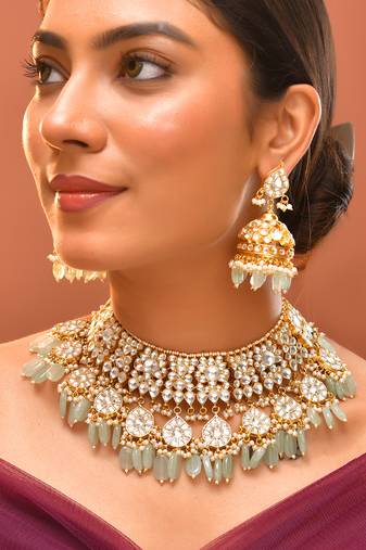 Gold plated kundan green stones necklace set