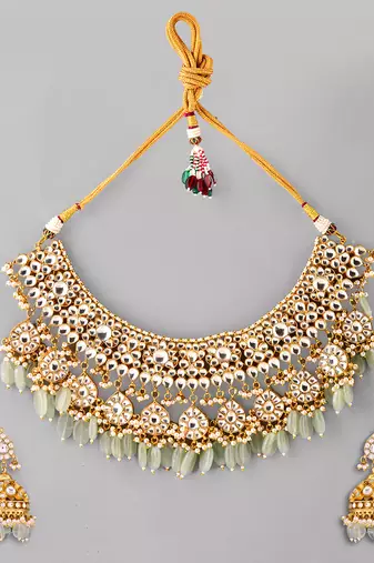 Gold plated kundan green stones necklace set