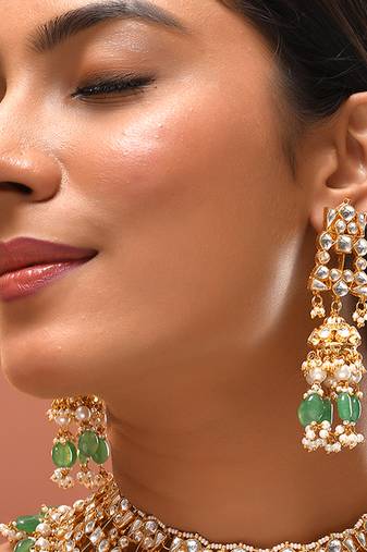 Gold plated kundan green stones necklace set