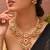 Gold plated kundan red stones necklace set