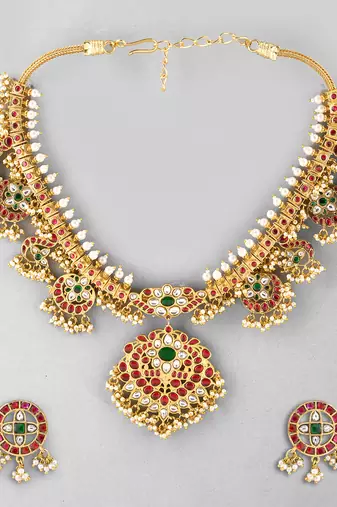 Gold plated kundan red stones necklace set