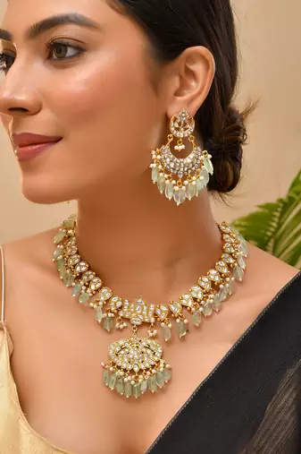 Gold plated kundan green stones necklace set