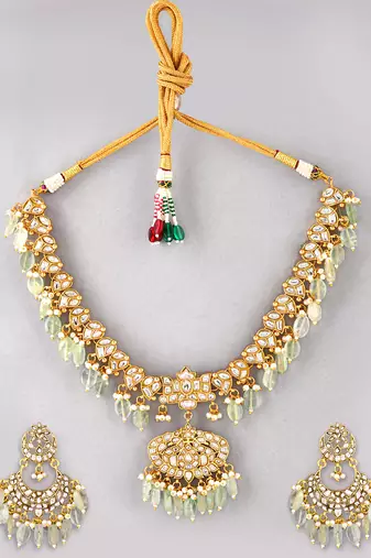 Gold plated kundan green stones necklace set