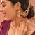 Gold plated kundan red stones earchain