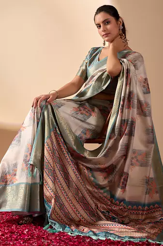 Beige soft lichi silk blend saree with traditional motifs, zari woven border & designer pallu