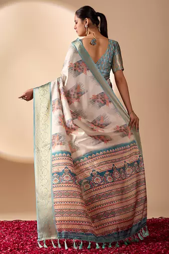 Beige soft lichi silk blend saree with traditional motifs, zari woven border & designer pallu