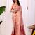 Light pink elegant printed soft silk saree with floral artistry & zari border – banarasi silk style saree with blouse