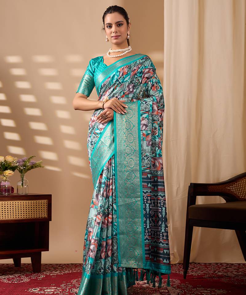 Turquoise green lichi silk saree with abstract & floral digital print and rich zari woven border with designer blouse