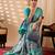Turquoise green lichi silk saree with abstract & floral digital print and rich zari woven border with designer blouse