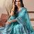 Aqua soft georgette saree with tribal floral digital print & tassel pallu with contrast blouse