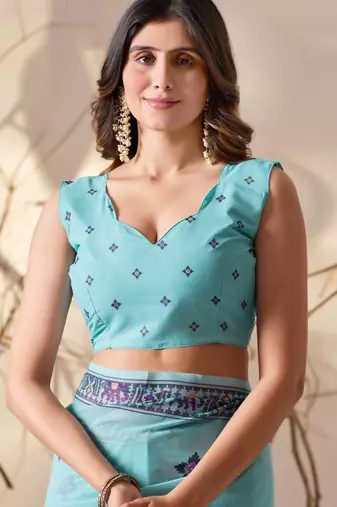 Aqua soft georgette saree with tribal floral digital print & tassel pallu with contrast blouse