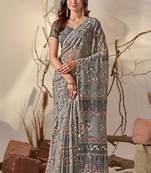 Grey digital print georgette saree with tribal pattern pallu & tassels – printed designer saree with blouse