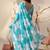 Aqua georgette saree with oversized floral digital print & tassel pallu | lightweight printed saree with blouse