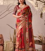 Red linen cotton saree with digital floral & artistic print and patola style contrast border with matching blouse
