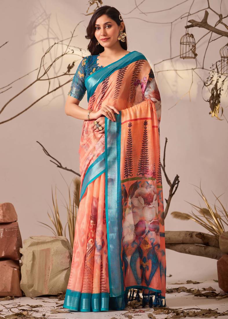Peach linen cotton saree with elegant digital floral & leaf print and patola style contrast border with matching blouse