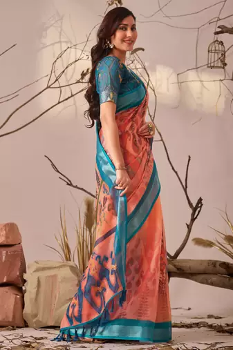 Peach linen cotton saree with elegant digital floral & leaf print and patola style contrast border with matching blouse