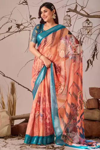Peach linen cotton saree with elegant digital floral & leaf print and patola style contrast border with matching blouse