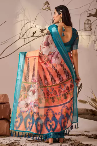 Peach linen cotton saree with elegant digital floral & leaf print and patola style contrast border with matching blouse