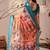 Peach linen cotton saree with elegant digital floral & leaf print and patola style contrast border with matching blouse