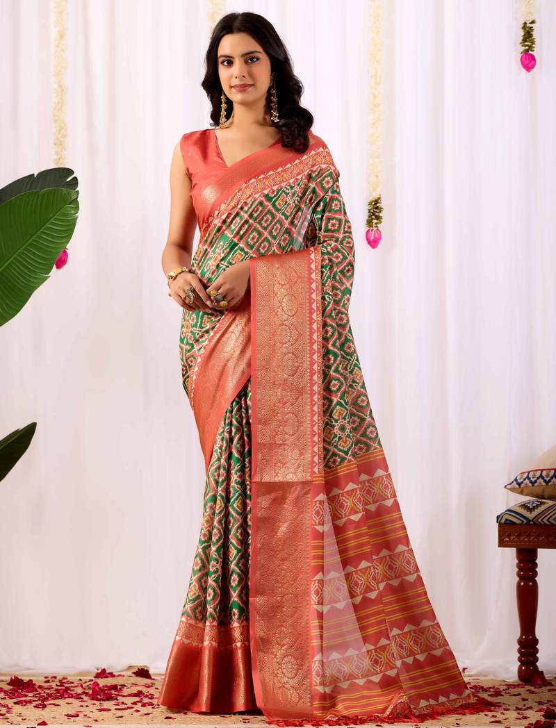 Green soft lichi silk patola weaving saree with rich zari border & contrast blouse