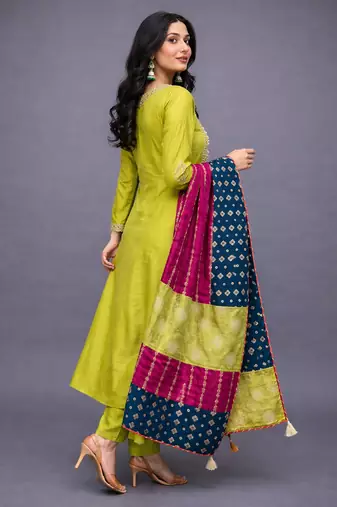 Elegant lime green chanderi kurta set with embroidered neck and contrast dupatta festive wear