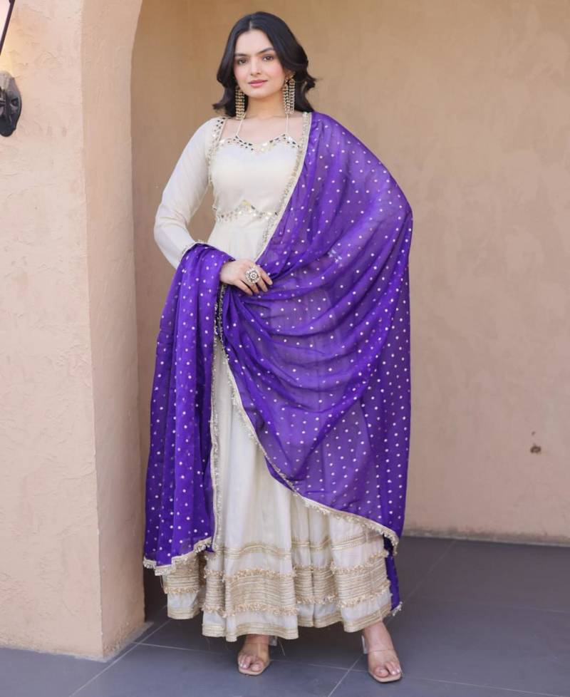 Off white cosmos real mirror with zari embroidered lace work flared gown with heavy dupatta