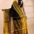 Black handloom saree with yellow traditional border & intricate weaving design