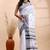 White & black handloom saree with minimalist woven motifs and classic contrast border